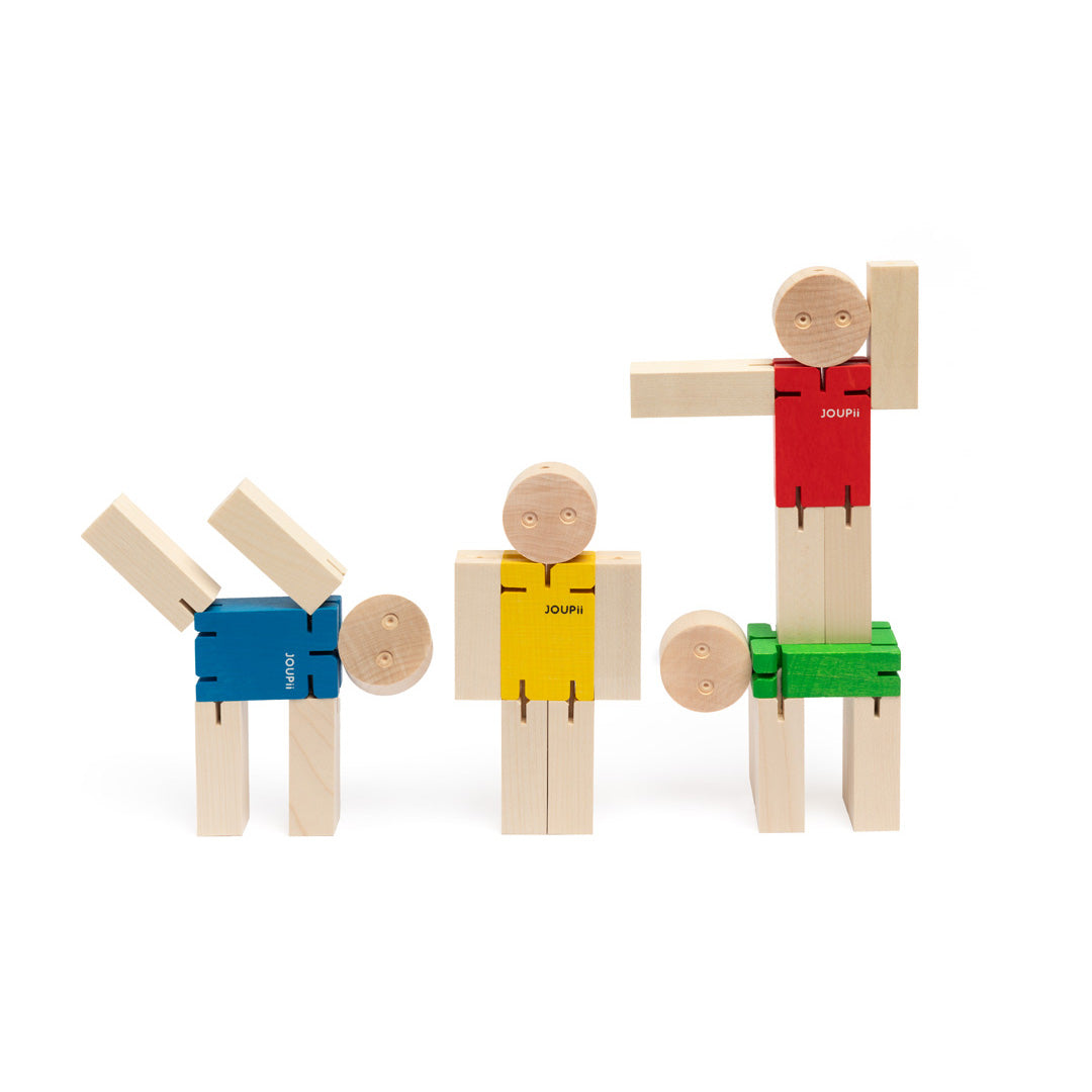 JOUPii wooden figure in 4 colors: yellow, red, blue, and green.