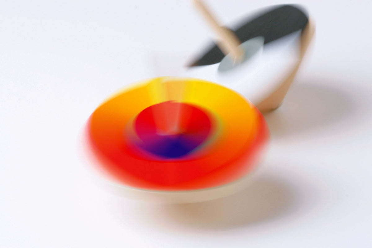 Spinning optical mixer with blended colors