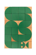 wooden blocks forming a green snake
