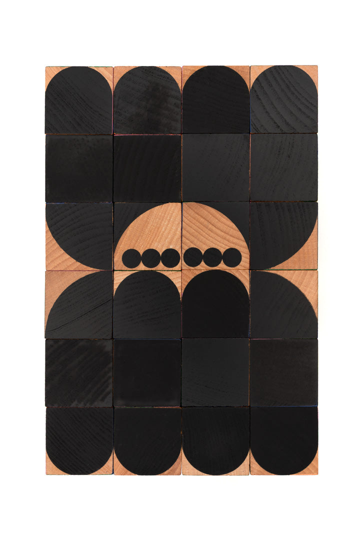 wooden blocks forming a black spider